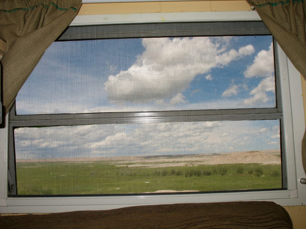 This is what the South Dakota Badlands looks like from the inside the wagon. Sometimes, the scenery was so big, I just couldn't take it and crawled back in to my wagon. (outside Interior, SD)