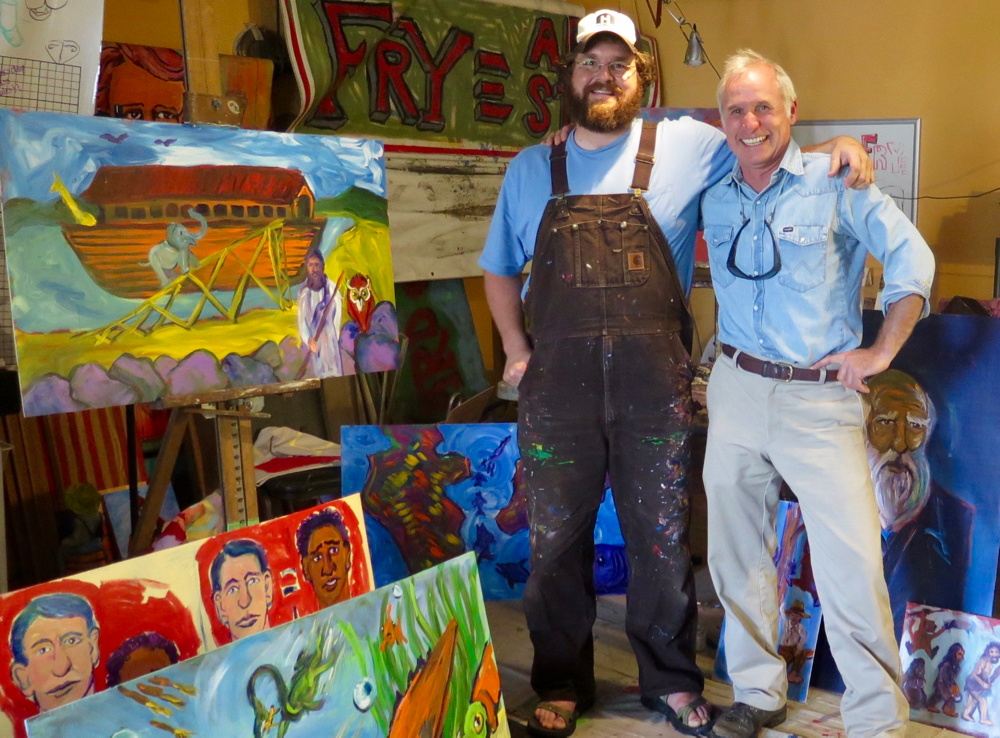 Folk artist Charlie Frye and me the day I picked up the paintings for the Lost Sea Expedition series. Propped up next to us, can get a sense of how large some of them are. Yeah, Charlie's a pretty big dude.